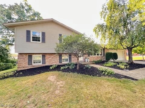 7367 WOODCREST AVE NE, CANTON, OH 44721, photo 2 of 37